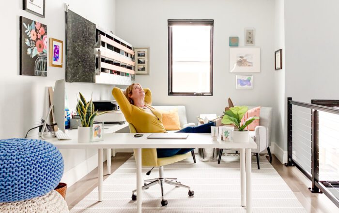 white desk yellow chair in productive home office loft