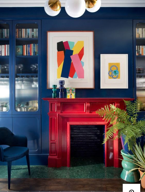 living room blue wall with red fireplace